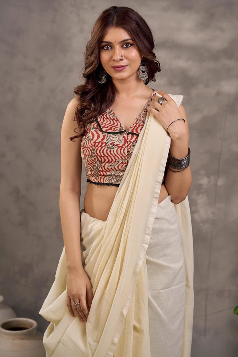 Rust Cotton Saree with Printed Sleeveless Blouse and Black Piping Detail