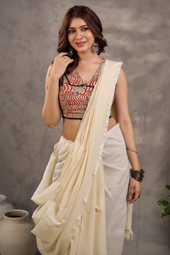 Rust Cotton Saree with Printed Sleeveless Blouse and Black Piping Detail