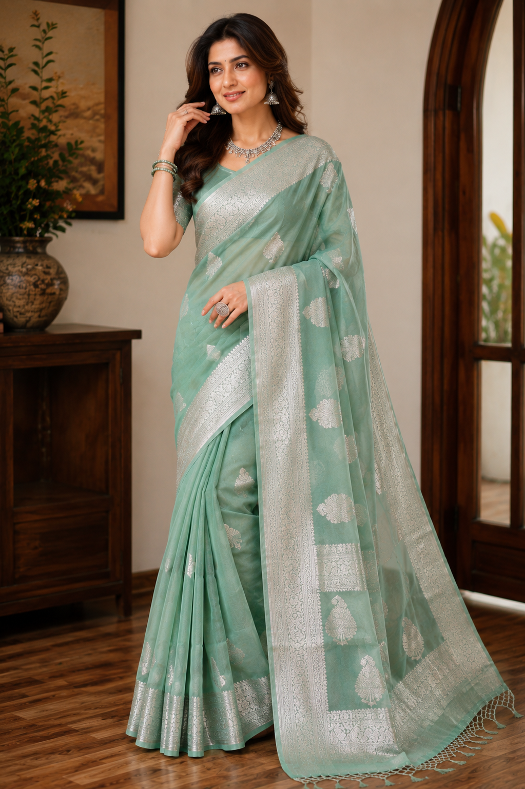 Mint Green Chiffon Saree with Silver Zari Woven Border