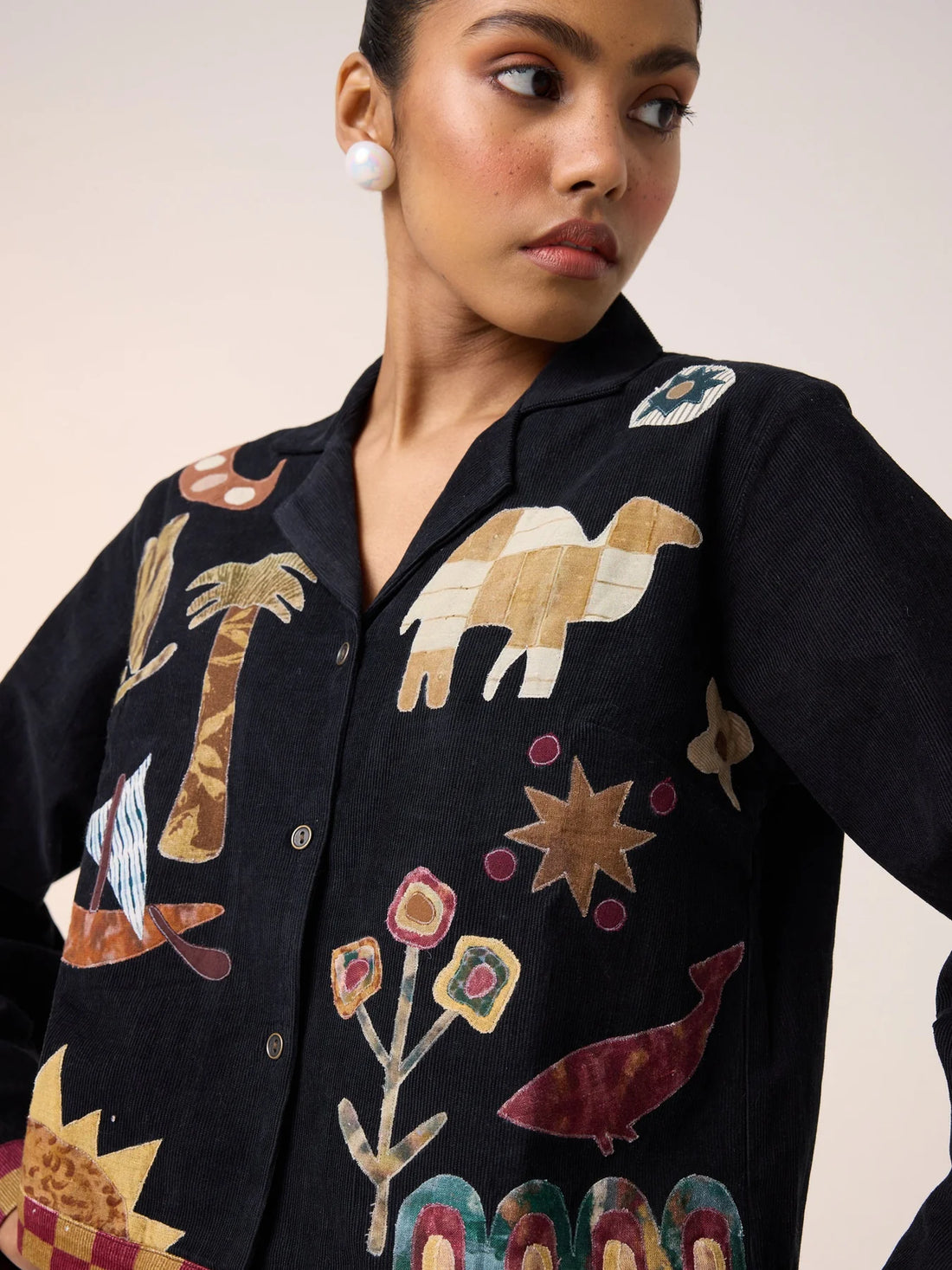 black applique shirt
