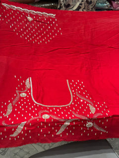 Red embroidered saree