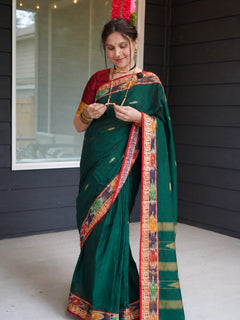Peacock and Patolla Rich Zari Woven Border Saree