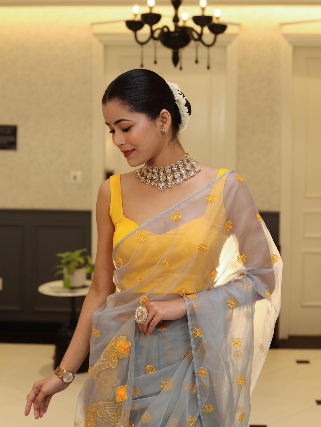Vastra Veda Ivory Organza Banarasi Butti Saree with Red Embroidery with a Stitched Blouse