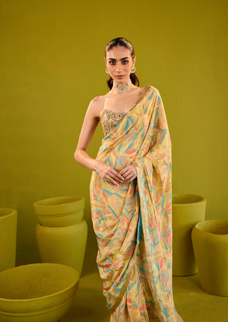 Yellow Crepe Saree With Gold Strapless Blouse