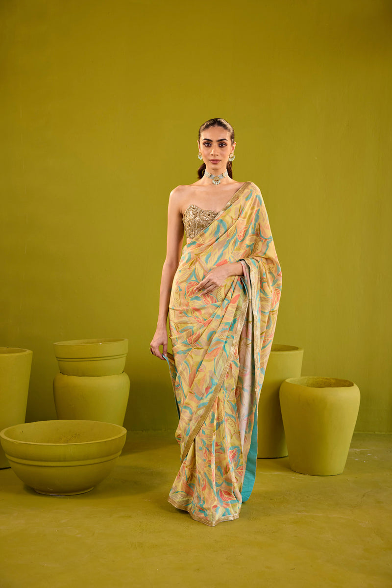 Yellow Crepe Saree With Gold Strapless Blouse