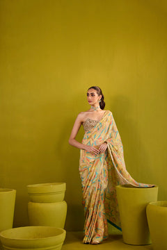Yellow Crepe Saree With Gold Strapless Blouse