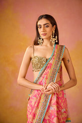 Pink Muslin Saree With Gold Embroidered Blouse