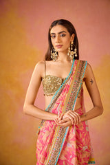 Pink Muslin Saree With Gold Embroidered Blouse