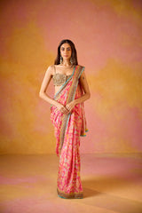 Pink Muslin Saree With Gold Embroidered Blouse