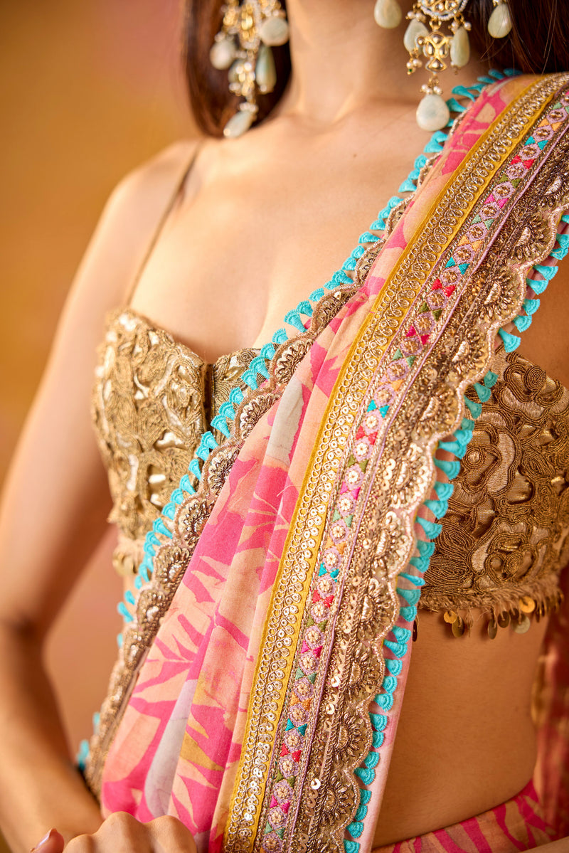 Pink Muslin Saree With Gold Embroidered Blouse