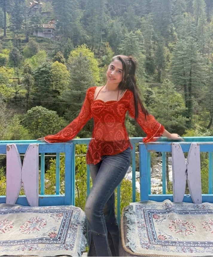 Noor Azzura Asymmetric Y2K Top