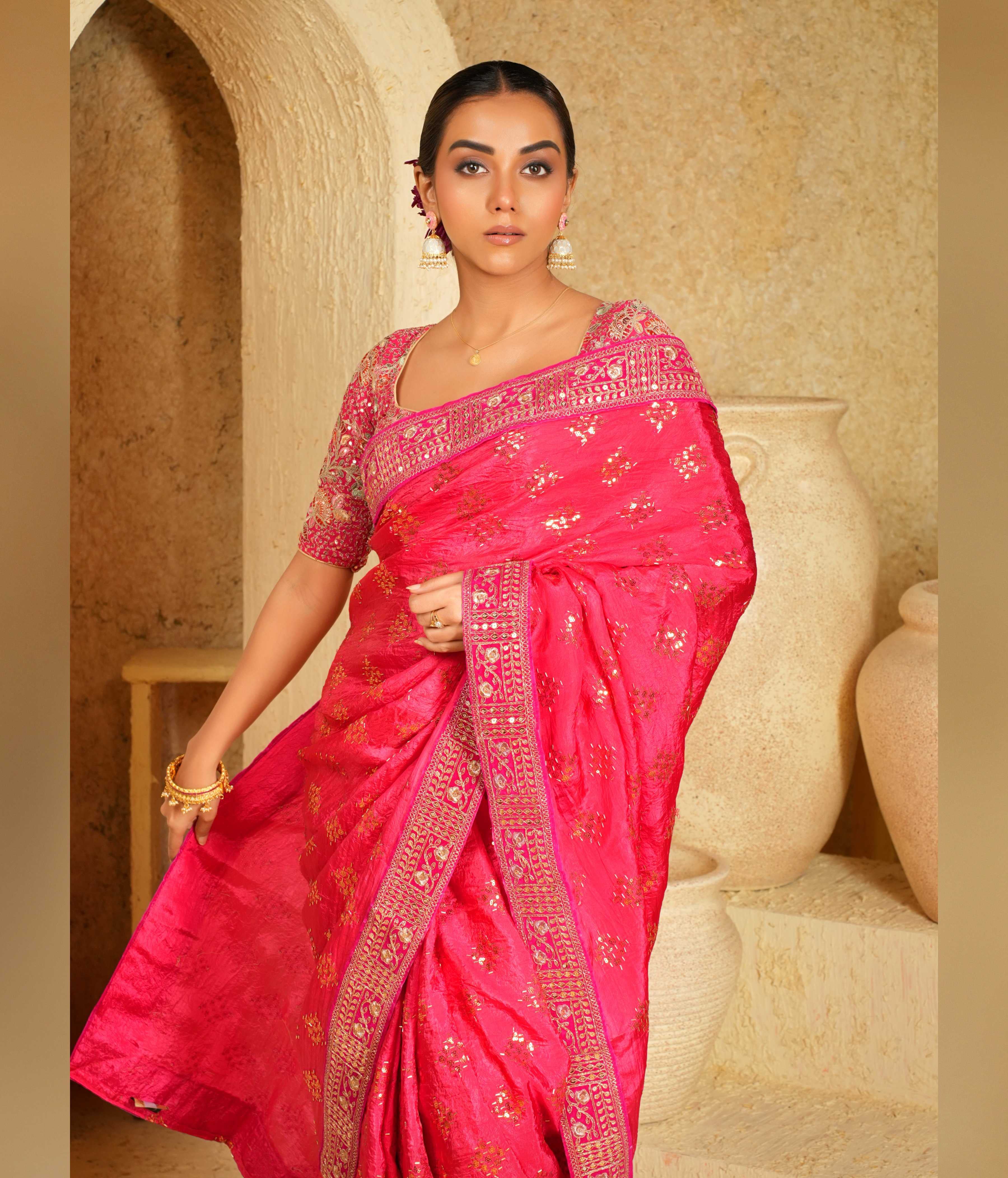 Embroidered saree with pink border
