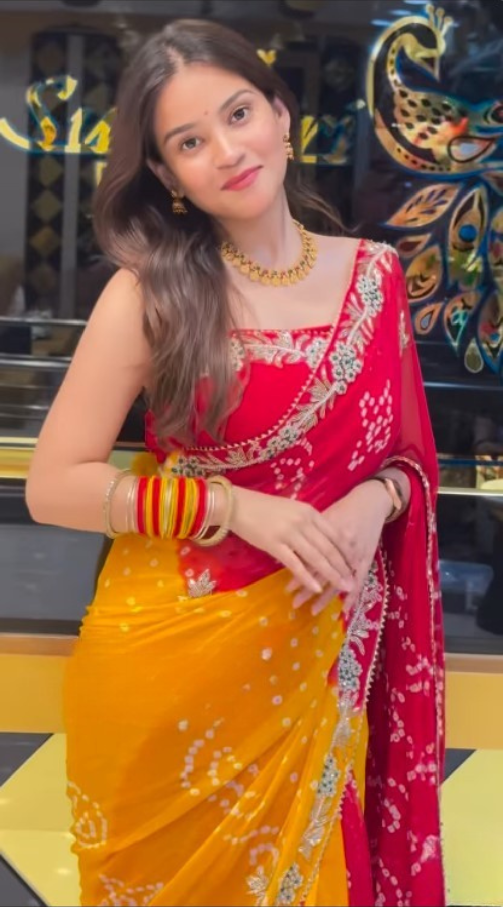 Vibrant Indian Saree & Gold Jewelry