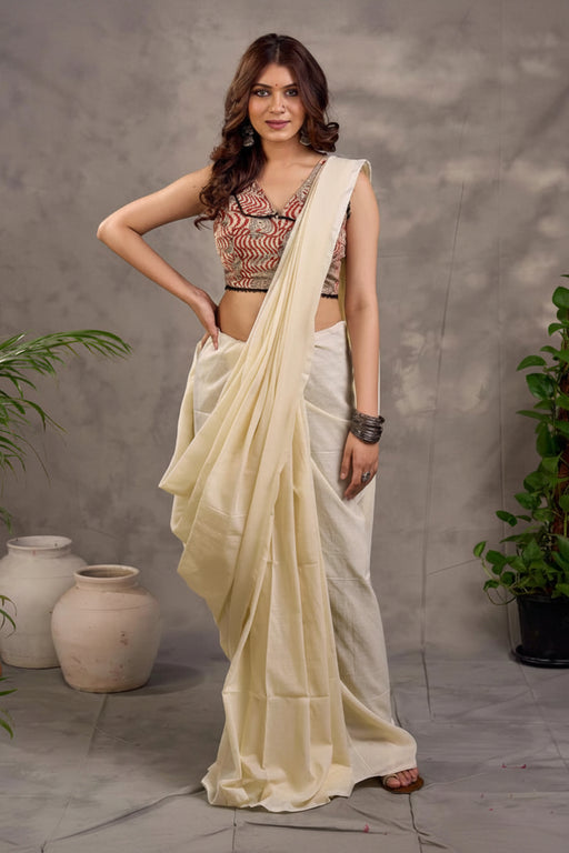 Rust Cotton Saree with Printed Sleeveless Blouse and  Black Piping Detail