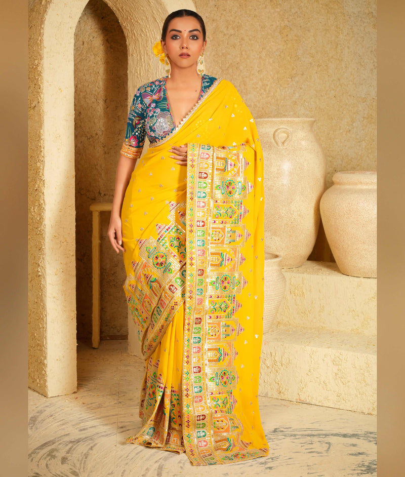 Vibrant yellow saree for weddings