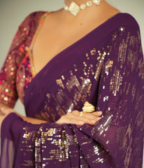 Bold wine saree for formal occasions