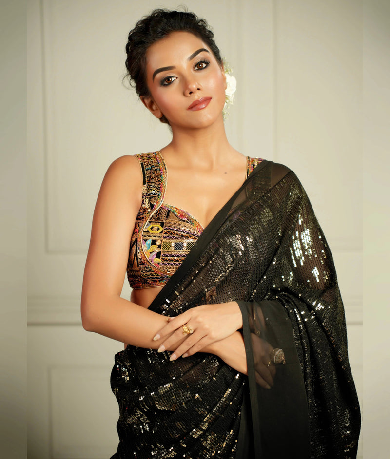 Bold black saree for formal occasions