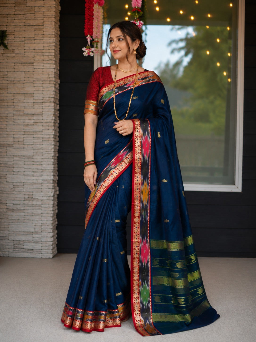Peacock and Patolla Rich Zari Woven Border Saree