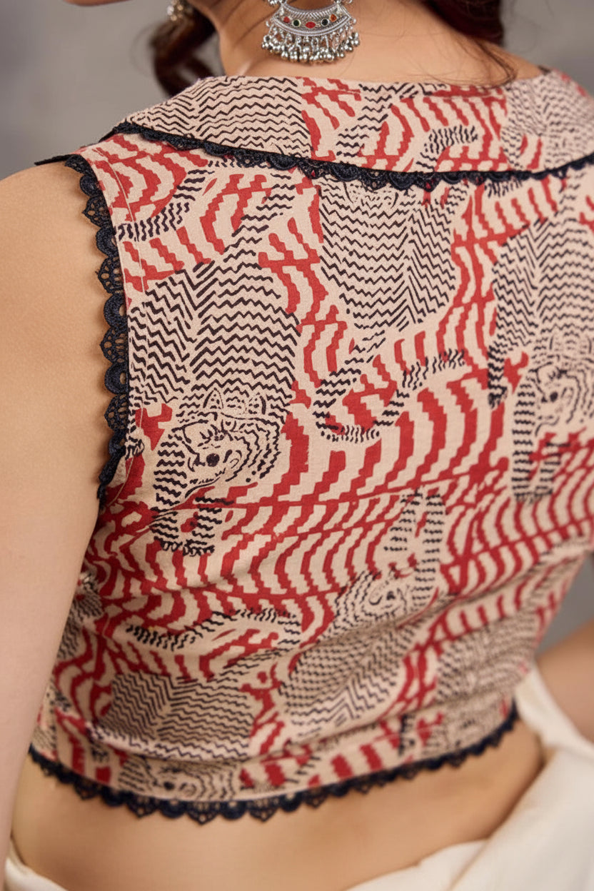 Rust Cotton Saree with Printed Sleeveless Blouse and  Black Piping Detail