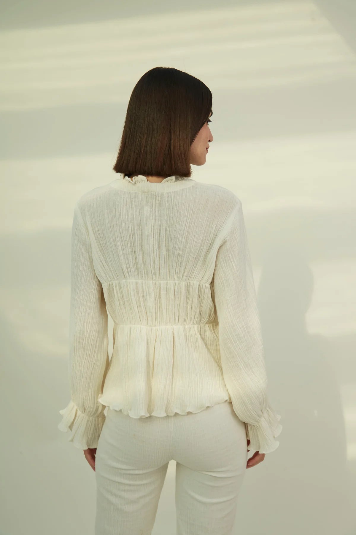 Relaxed fit tiered cotton blouse