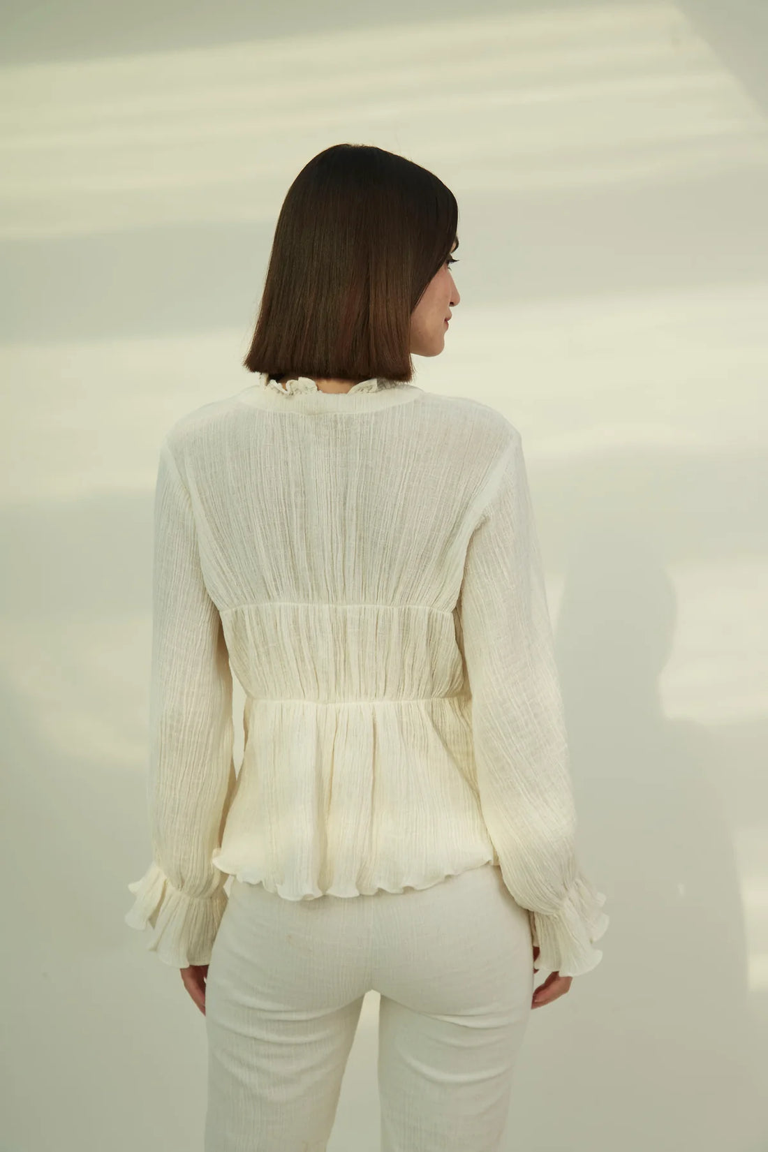 Relaxed fit tiered cotton blouse