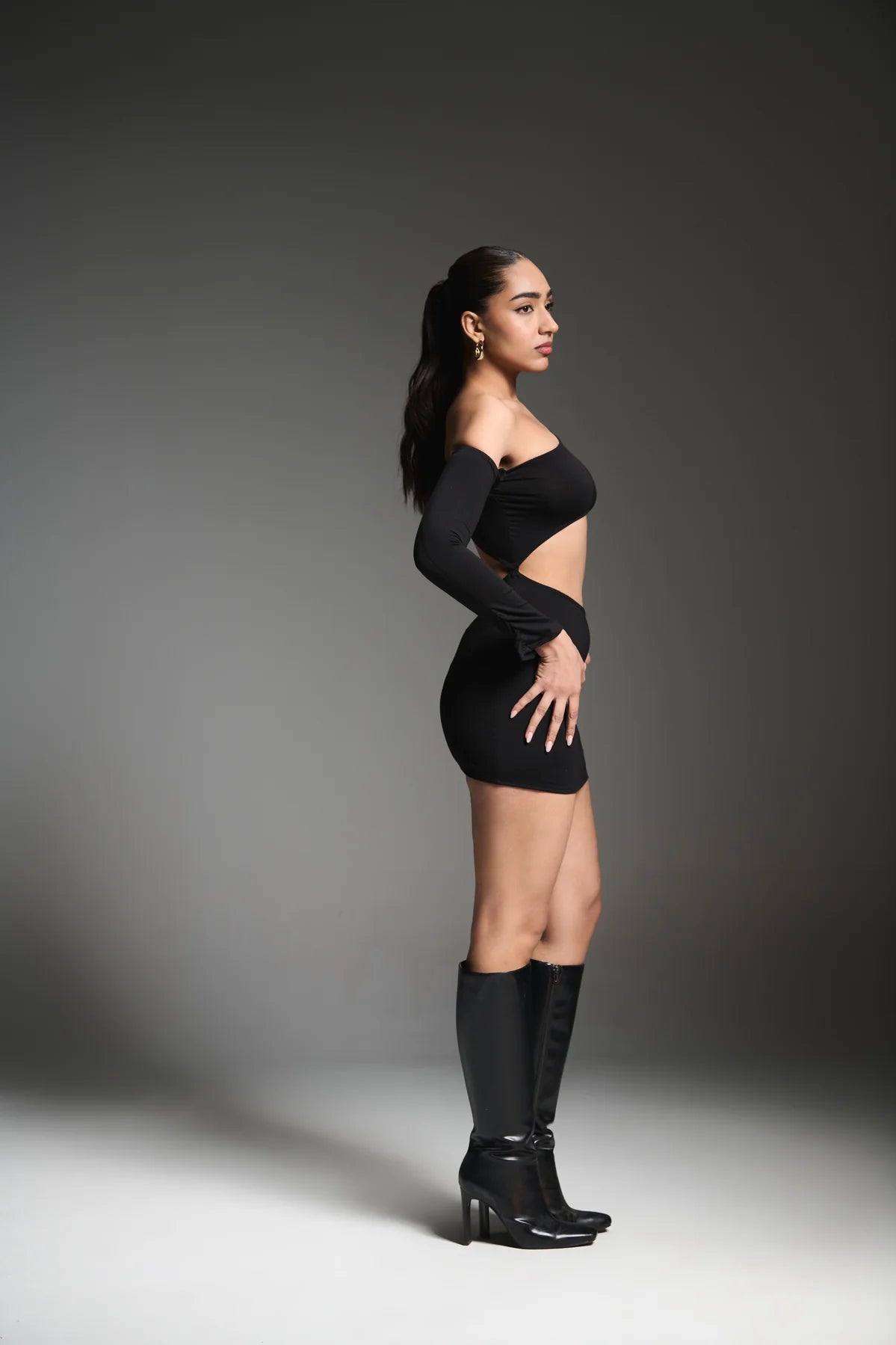 Black asymmetrical neckline dress