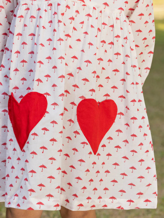 Kids' dress with heart pockets