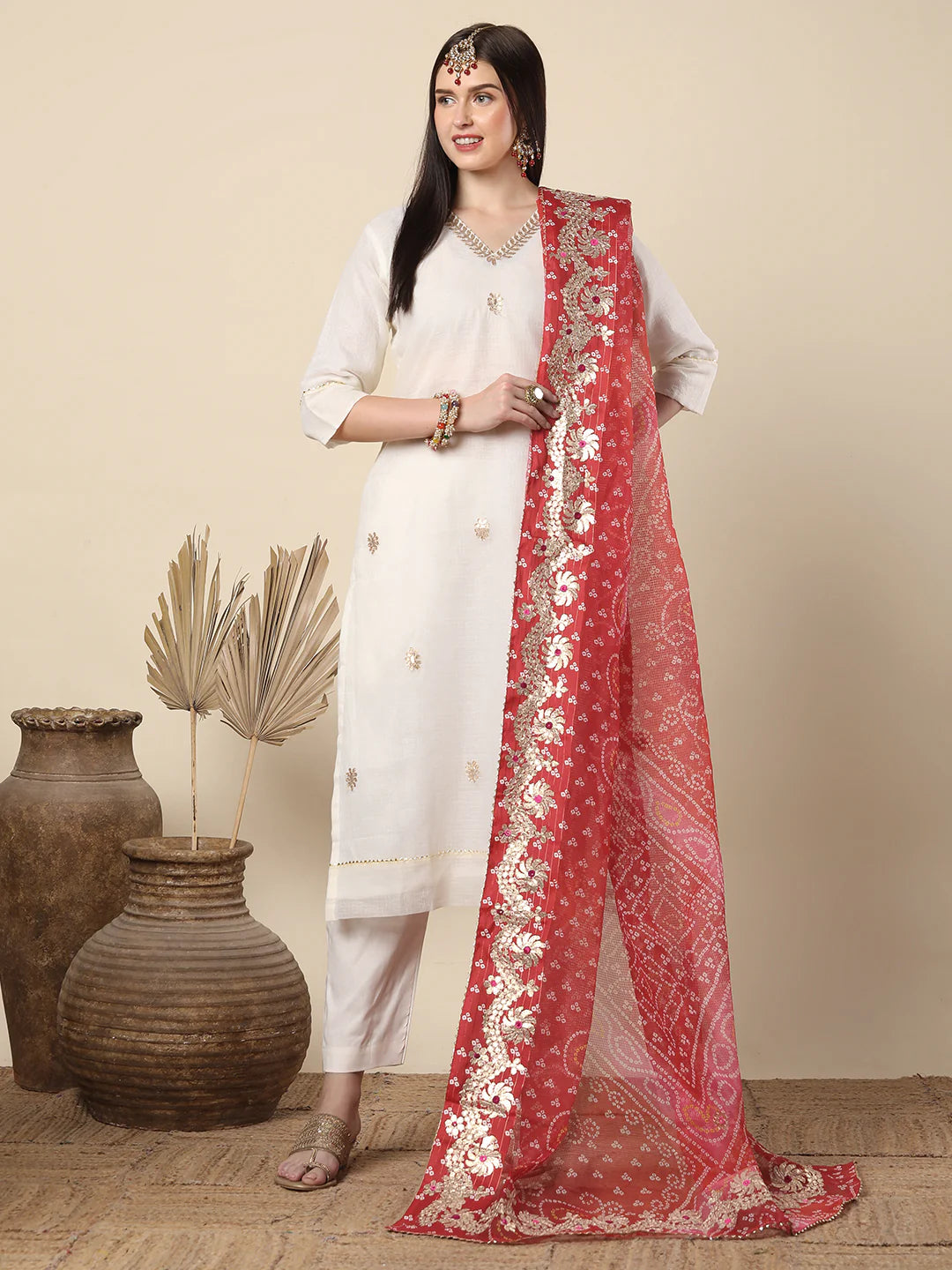 Supernet Off White Gota Patti Suit