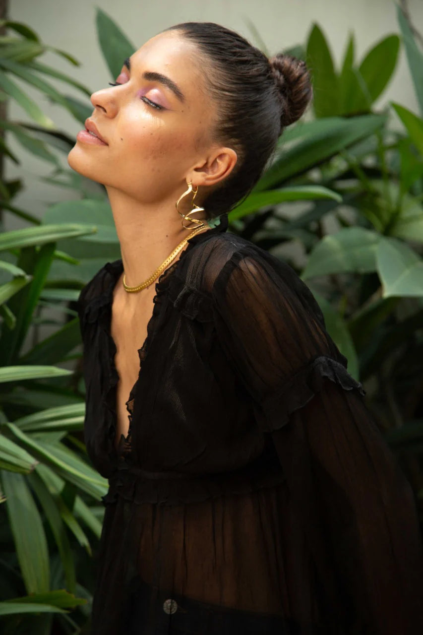 Flowy black top with ruffles