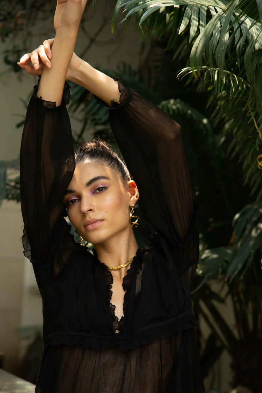 Stylish black top for layering