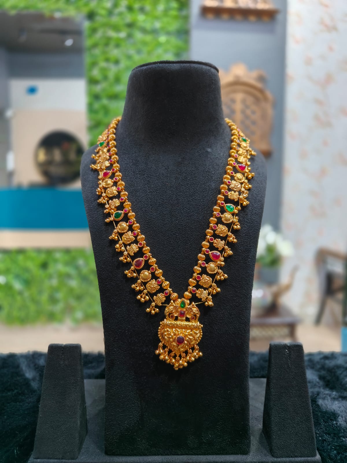 Traditional Ruby and Emerald Studded Gold-Plated Long Haram kolhapuri saaj
