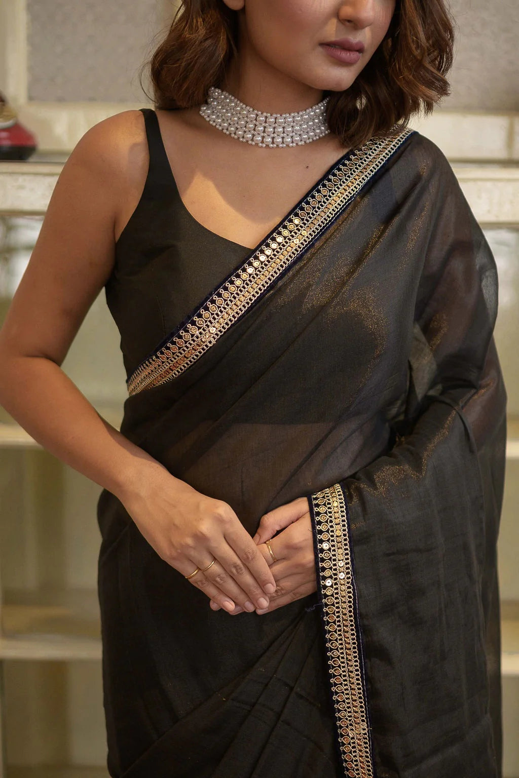Zari work black saree for special occasions