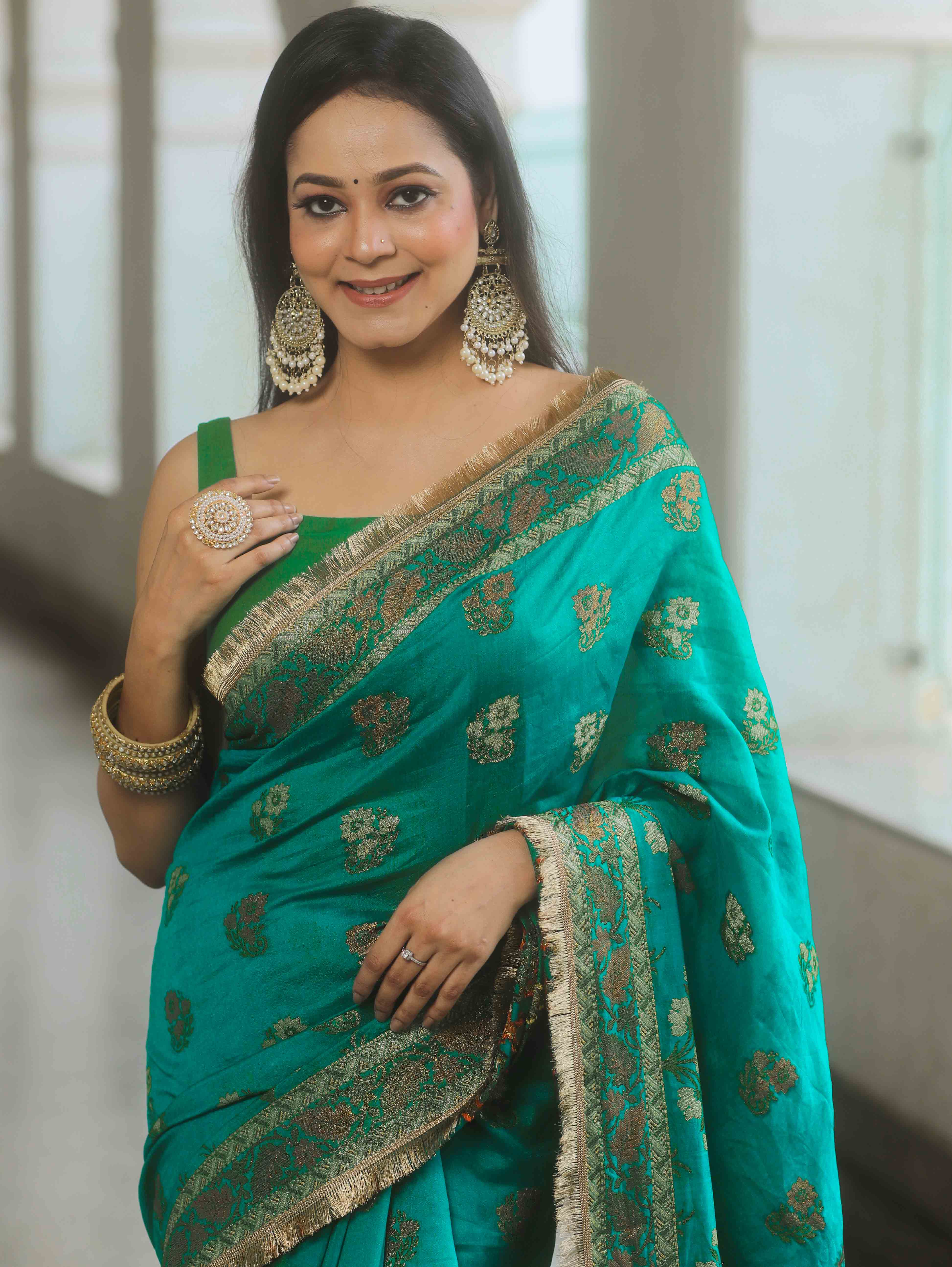 Banarasee Teal Georgette Zari Saree