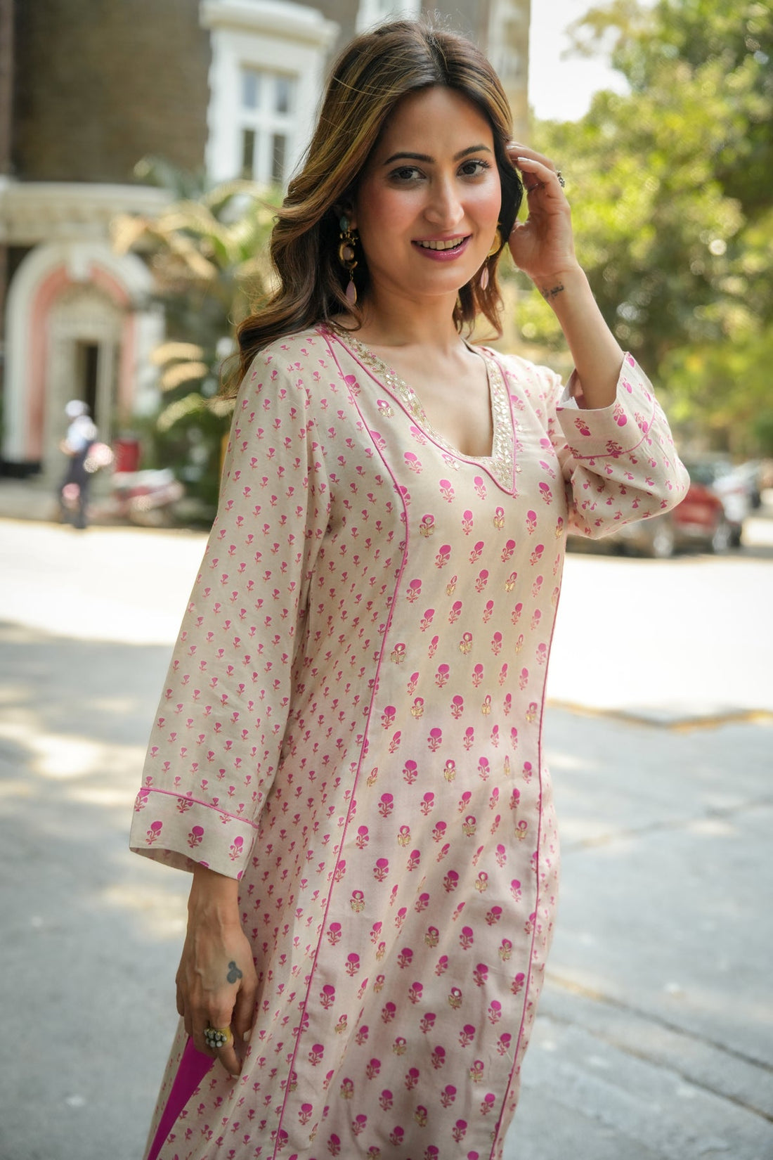 Beige kurta with pink accents