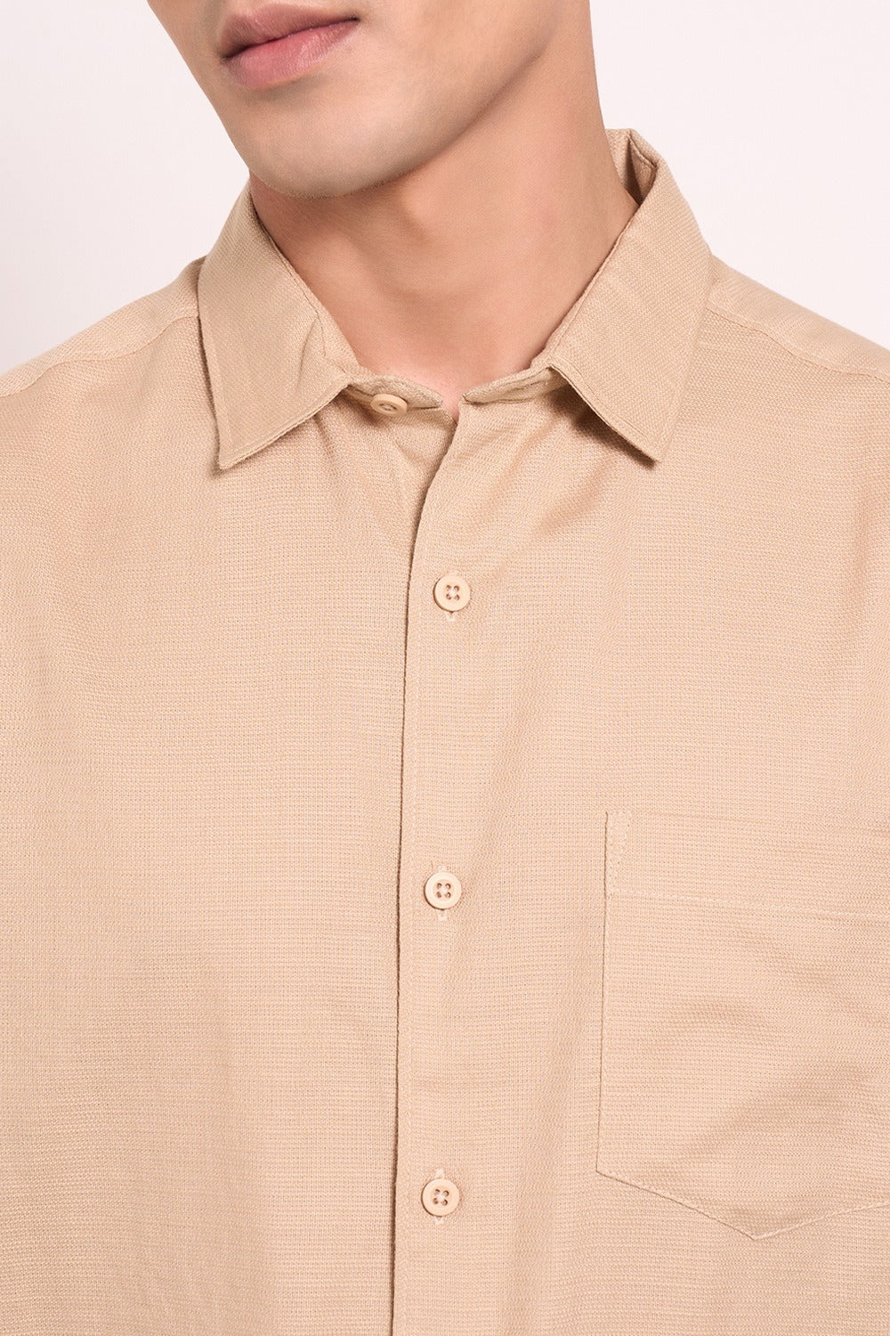 Beige button-down shirt