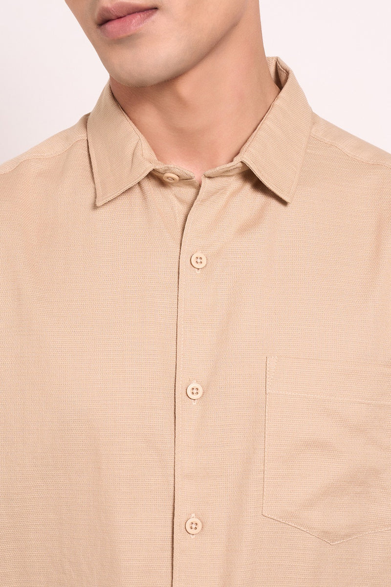 Beige button-down shirt