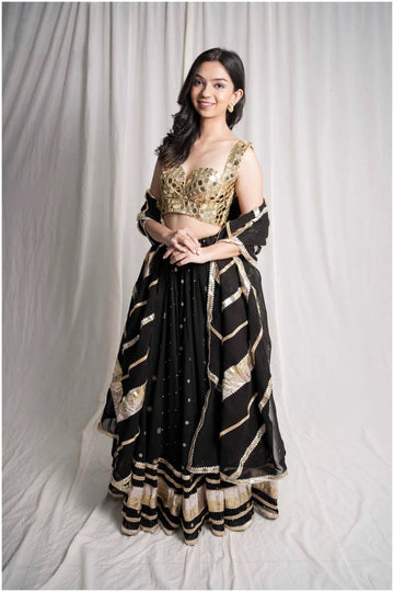 black golden skirt set