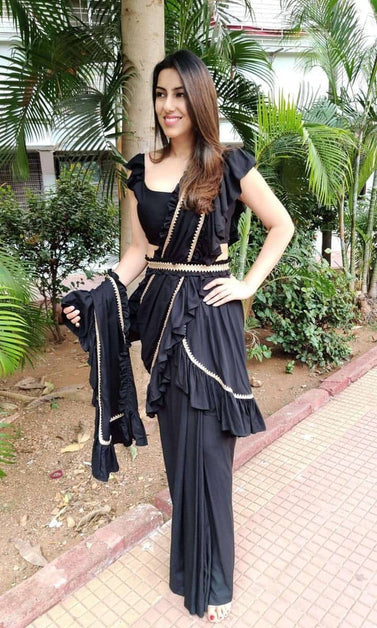 black saree with blouse and belt