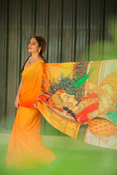 Fluttering Charm Yellow Orange Mul Mul Printed Saree