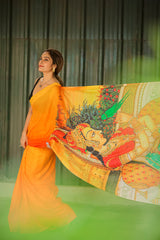 Fluttering Charm Yellow Orange Mul Mul Printed Saree
