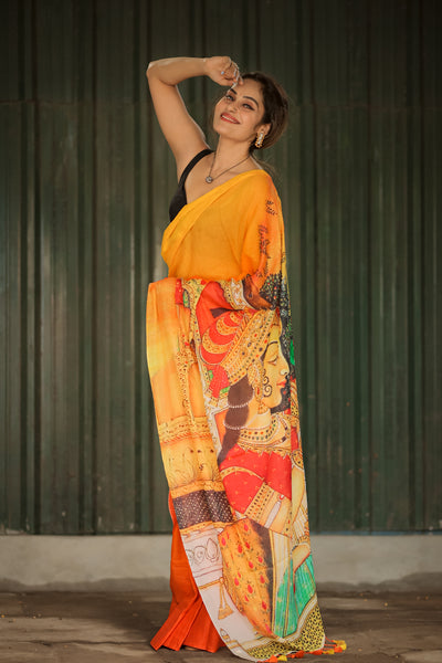 Fluttering Charm Yellow Orange Mul Mul Printed Saree