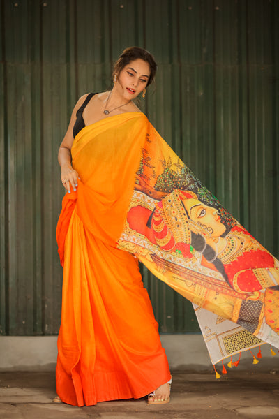 Fluttering Charm Yellow Orange Mul Mul Printed Saree