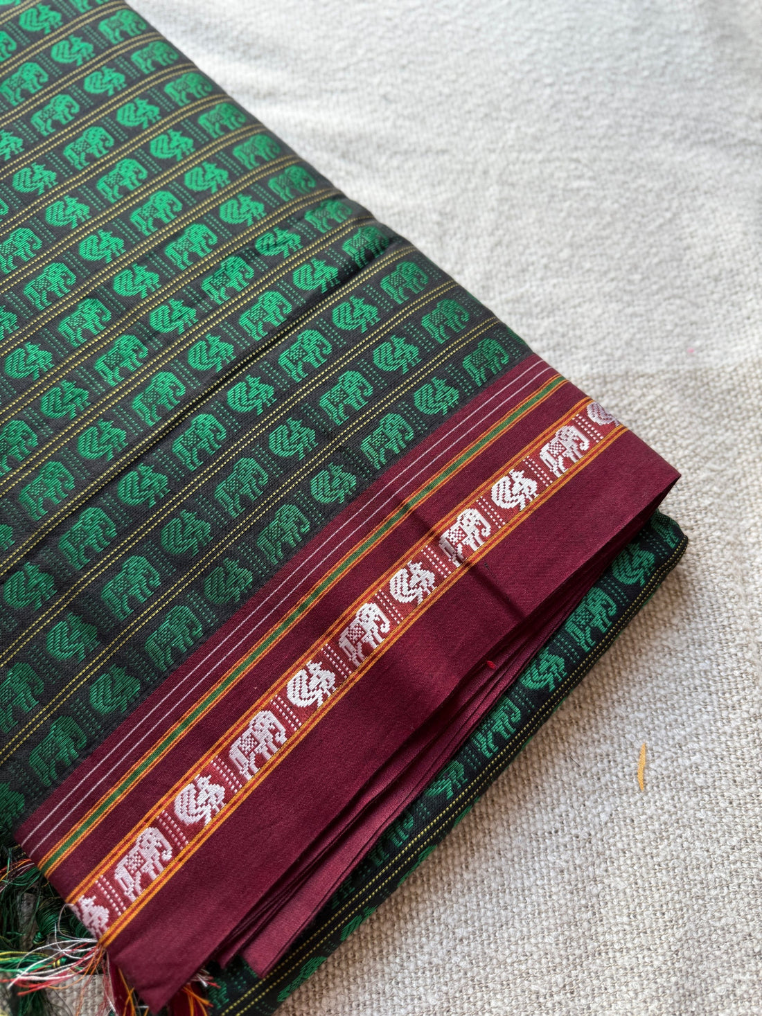 Hati Mor Green Khun Saree with Maroon Border