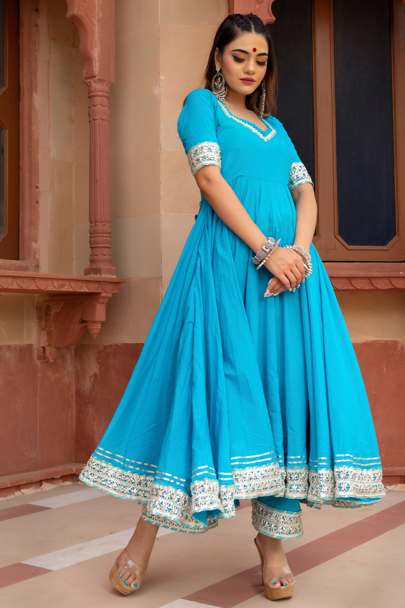 Sky blue anarkali with lace and stonework