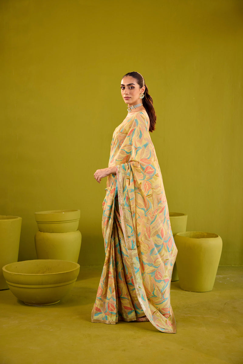 Yellow Crepe Saree With Gold Strapless Blouse