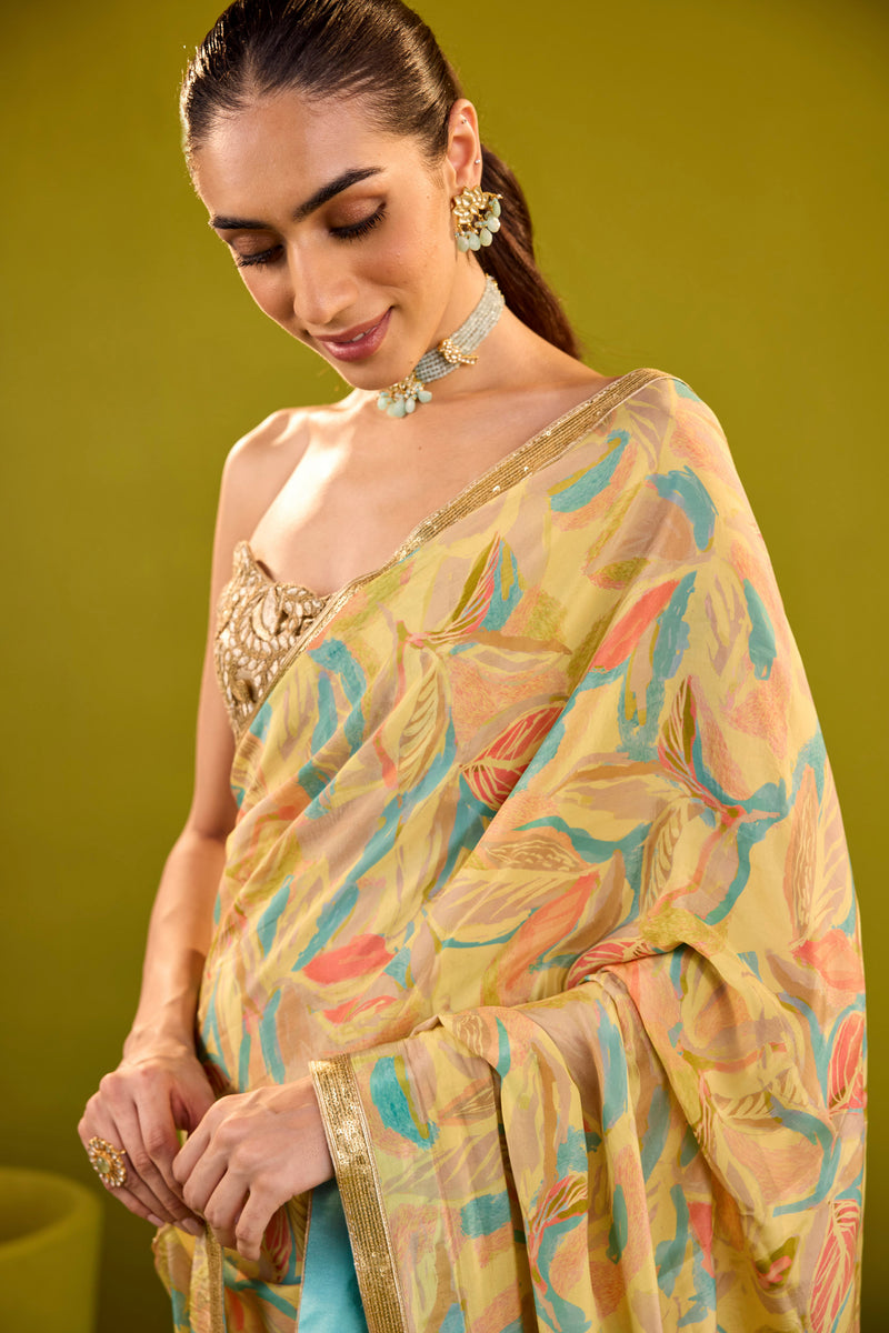 Yellow Crepe Saree With Gold Strapless Blouse