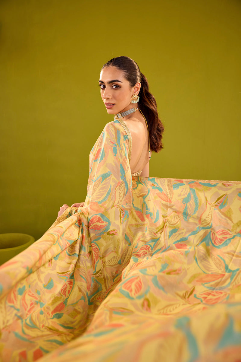 Yellow Crepe Saree With Gold Strapless Blouse