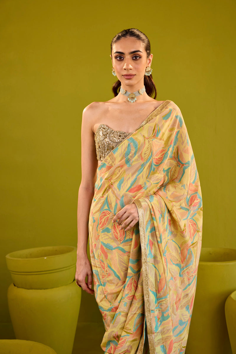 Yellow Crepe Saree With Gold Strapless Blouse