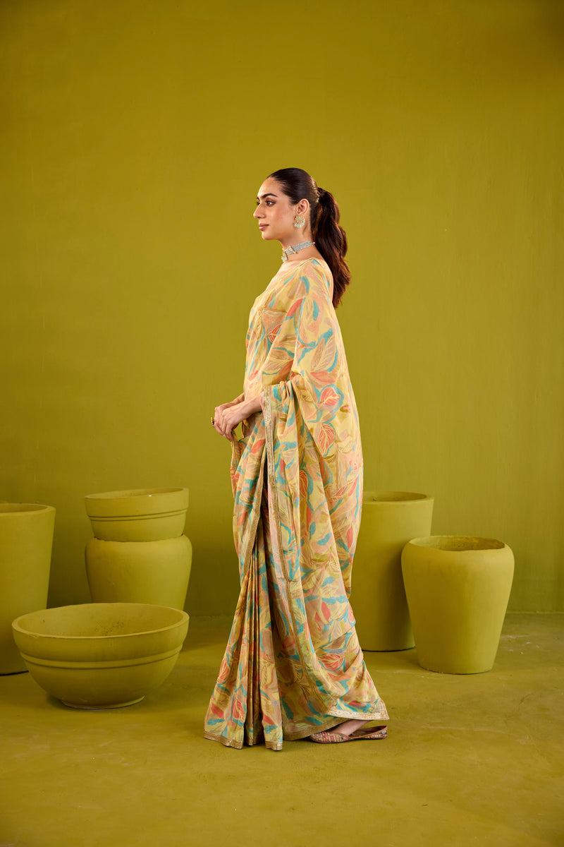 Yellow Crepe Saree With Gold Strapless Blouse