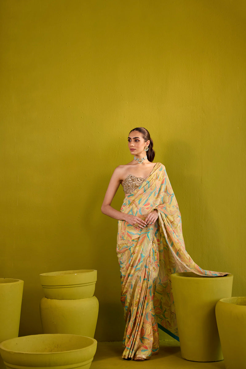 Yellow Crepe Saree With Gold Strapless Blouse